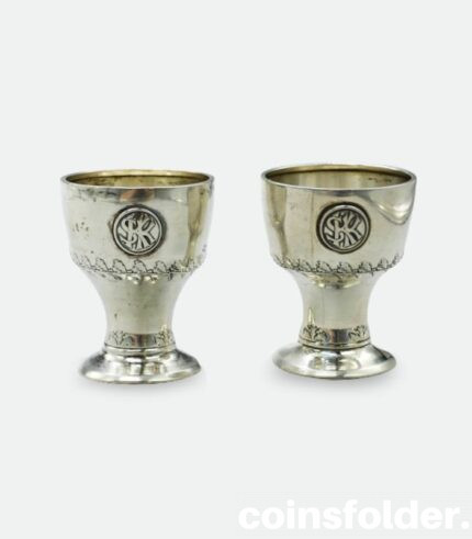 Antique silver egg cups with monogram dated 1910
