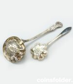 antique 1873 Silver Slotted Spoon and New Silver Slotted Spoon