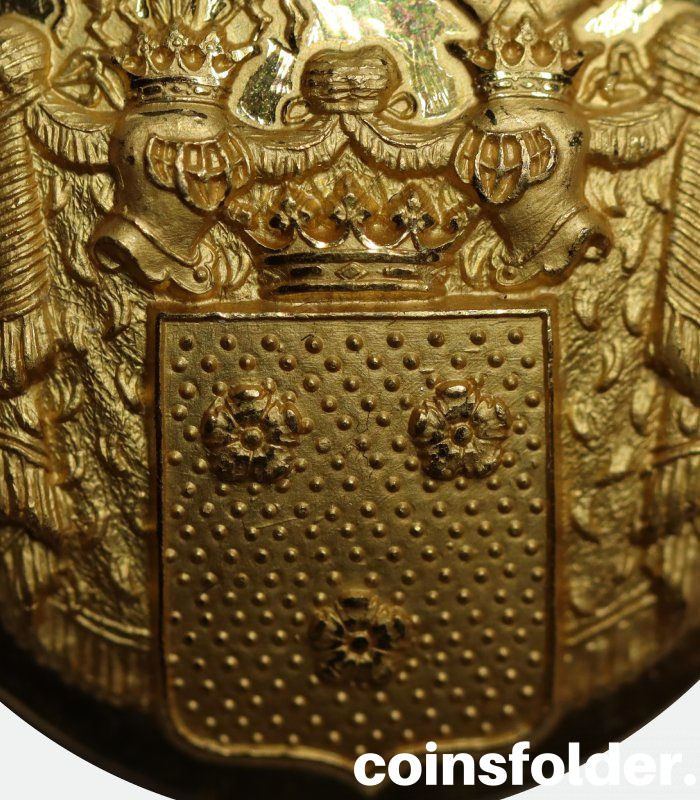 gilded livery button with the family coat of arms of von rosen