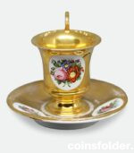 Antique France Paris Porcelain Gilded Flora Lion Handle Cup and Saucer XIX c.