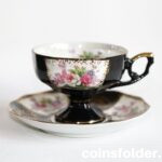 Vintage Porcelain Cup and Saucer, black with flowers