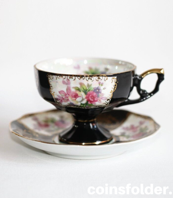 Vintage Porcelain Cup and Saucer, black with flowers