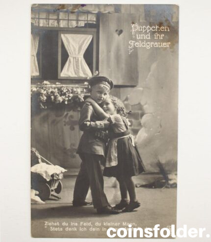 A boy and a girl, antique 1920's black & white postcard