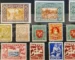 A collection of early Lithuanian postage stamps from 1918 to 1940, showcasing the Vytis and other national symbols.
