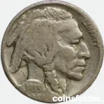 1935 USA Philadelphia 5 Cents "Buffalo Nickel" featuring Native American chiefs and an American bison.