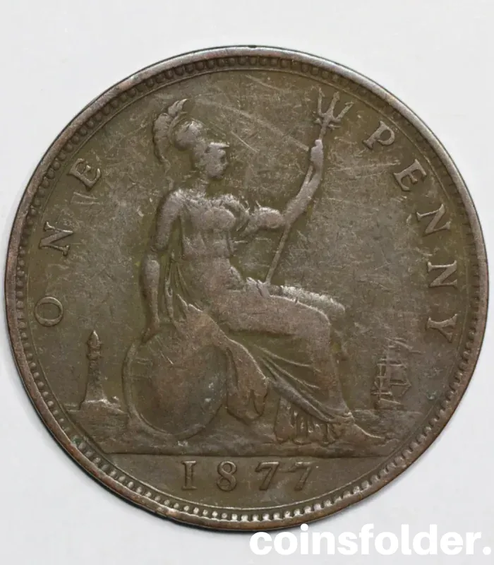 1877 United Kingdom 1 Penny, VG condition with Queen Victoria’s "Bun" portrait.