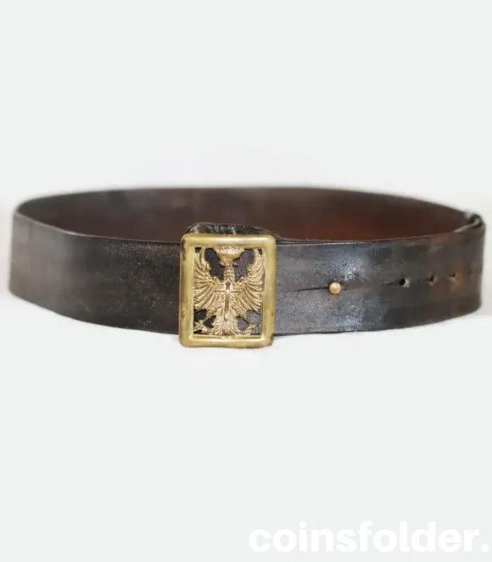 Vintage Spanish Army leather belt with 1943 eagle emblem buckle.