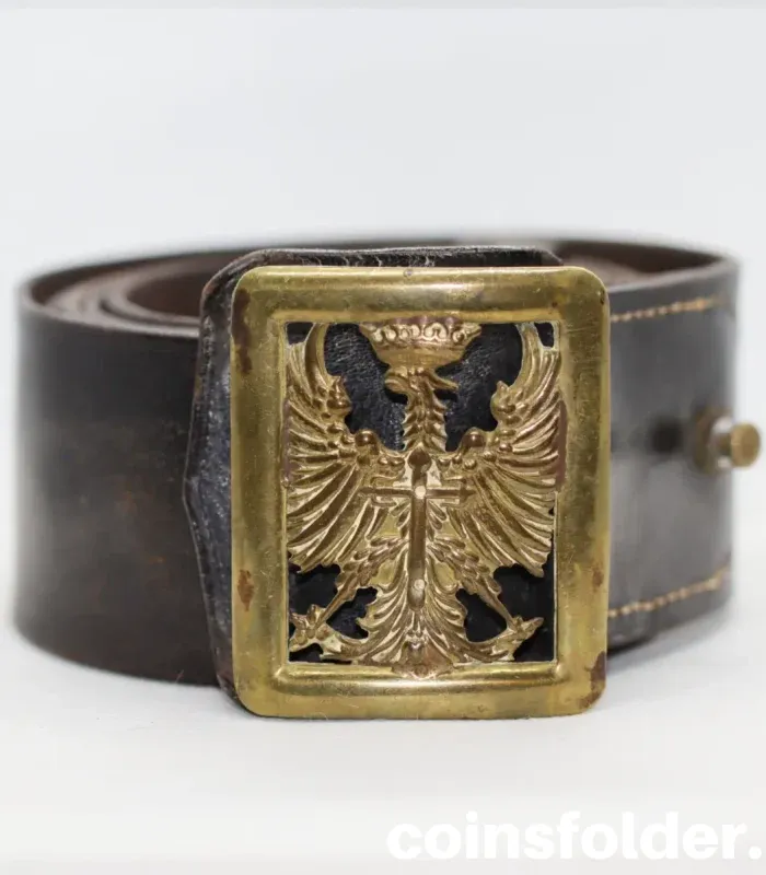 Vintage Spanish Army leather belt with 1943 eagle emblem buckle.