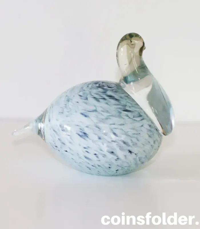 Light blue marble Meri Lasi glass bird with a clear neck, handmade Finnish art.