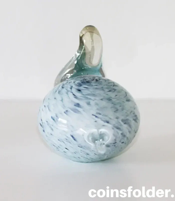 Light blue marble Meri Lasi glass bird with a clear neck, handmade Finnish art.