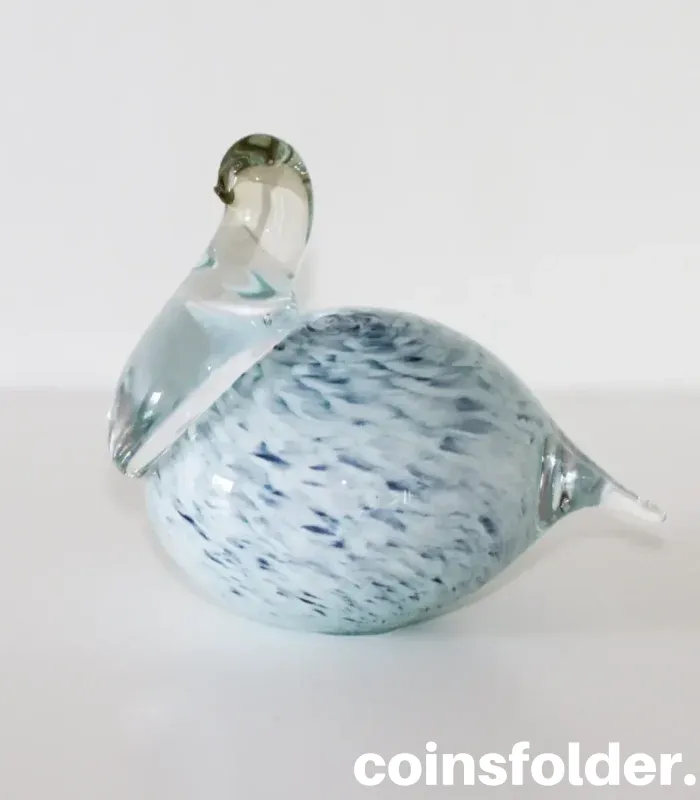 Light blue marble Meri Lasi glass bird with a clear neck, handmade Finnish art.