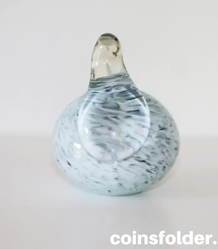 Light blue marble Meri Lasi glass bird with a clear neck, handmade Finnish art.