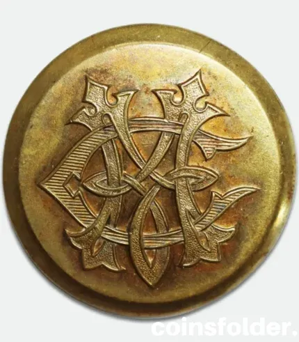 Antique gilded livery button with MC monogram