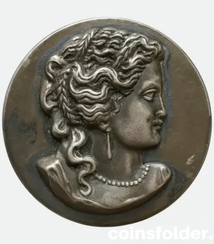 Antique 19th century button with classical woman bust design