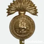 WWI British Northumberland Fusiliers Cap Badge
