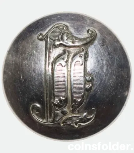 Antique silvered livery button with monogram engraving